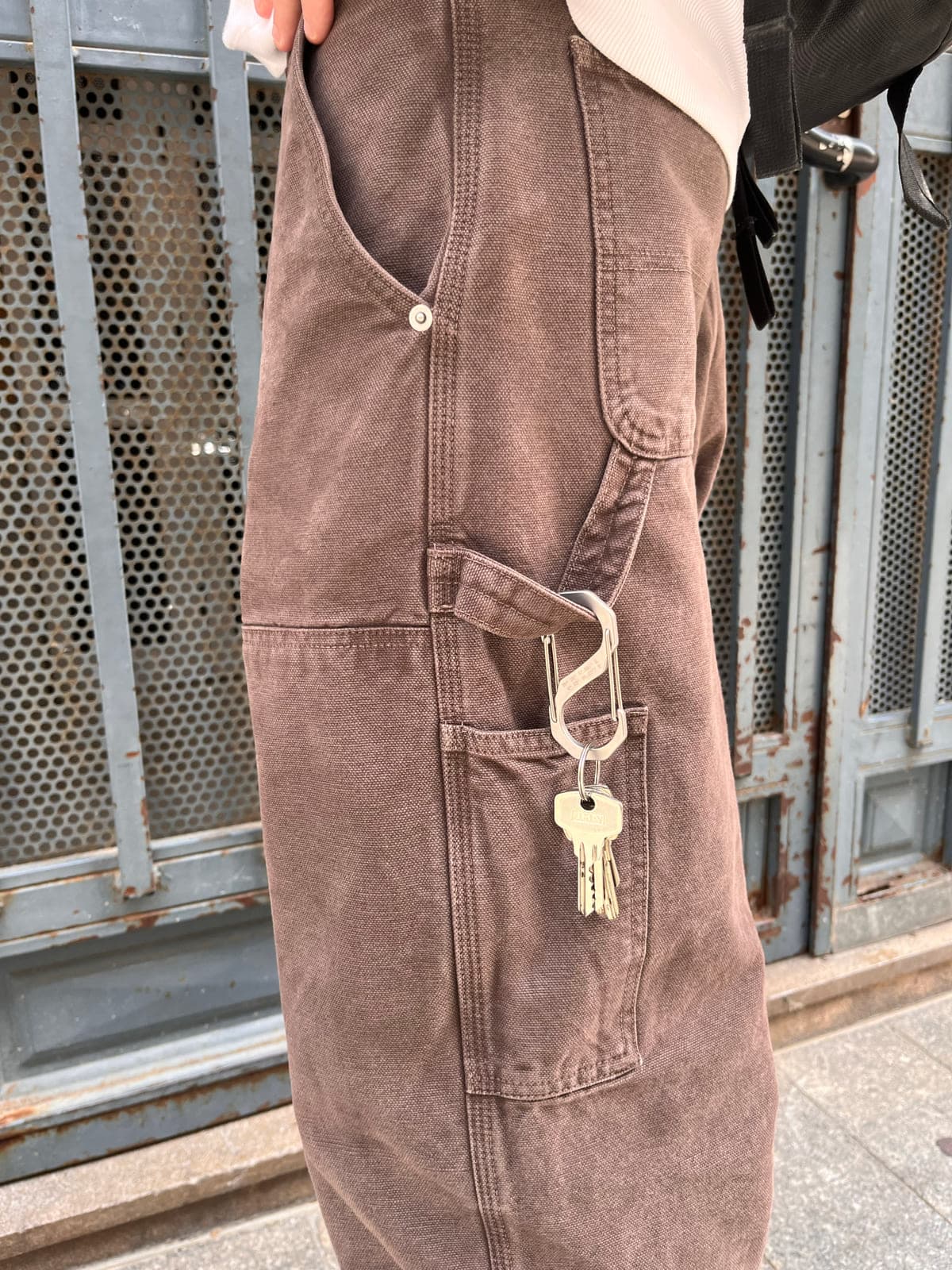 S-CARABINER hanging keys off a workwear pocket
