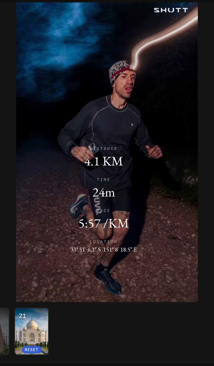 Night-run photo with distance, time, pace and location coordinates centred in a serif face